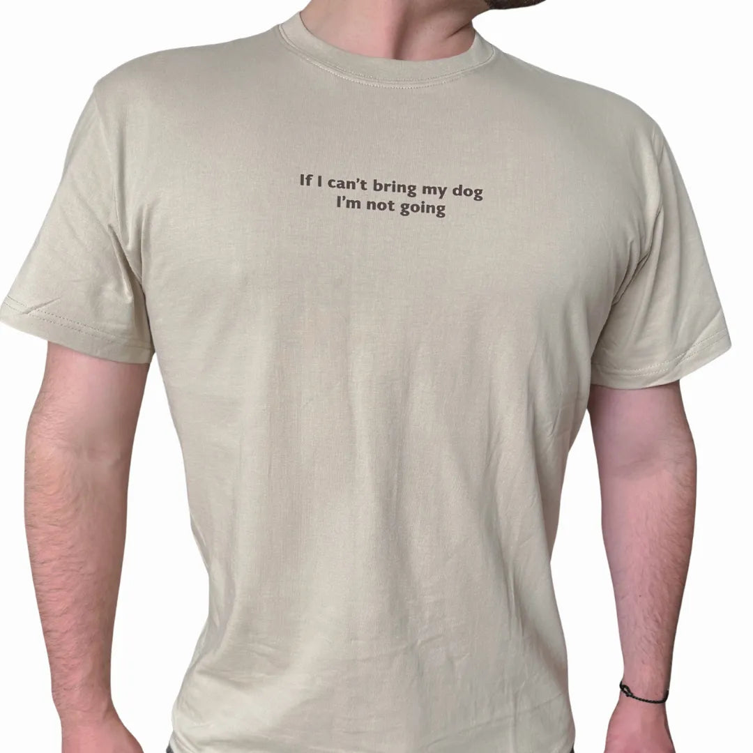 Beige t-shirt with text 'If I can't bring my dog, I'm not going' on a white background