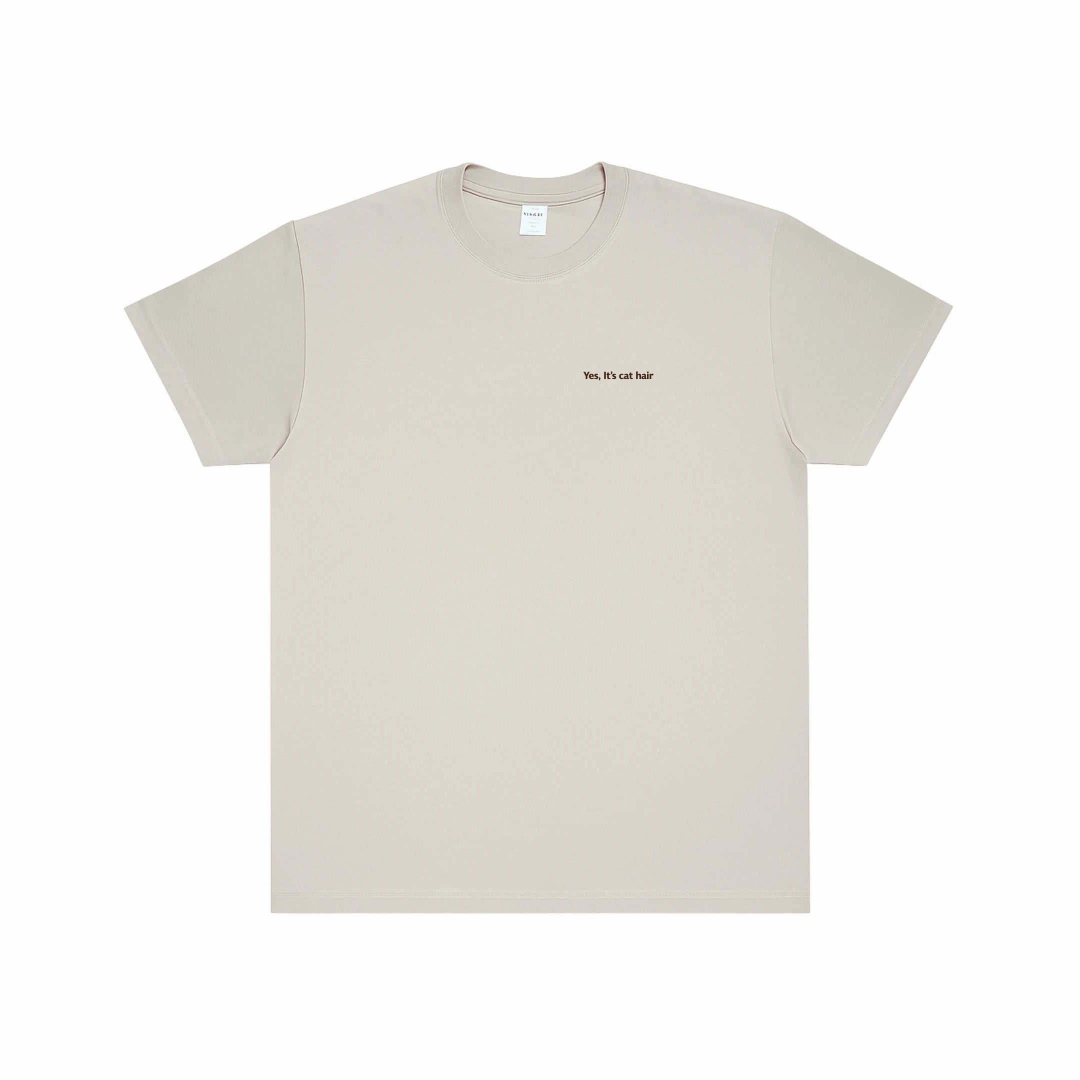 Beige t-shirt with text on a white background