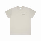 Beige t-shirt with text on a white background